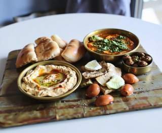 Middle Eastern Brunch Spread: Hummus, Shakshuka, and More